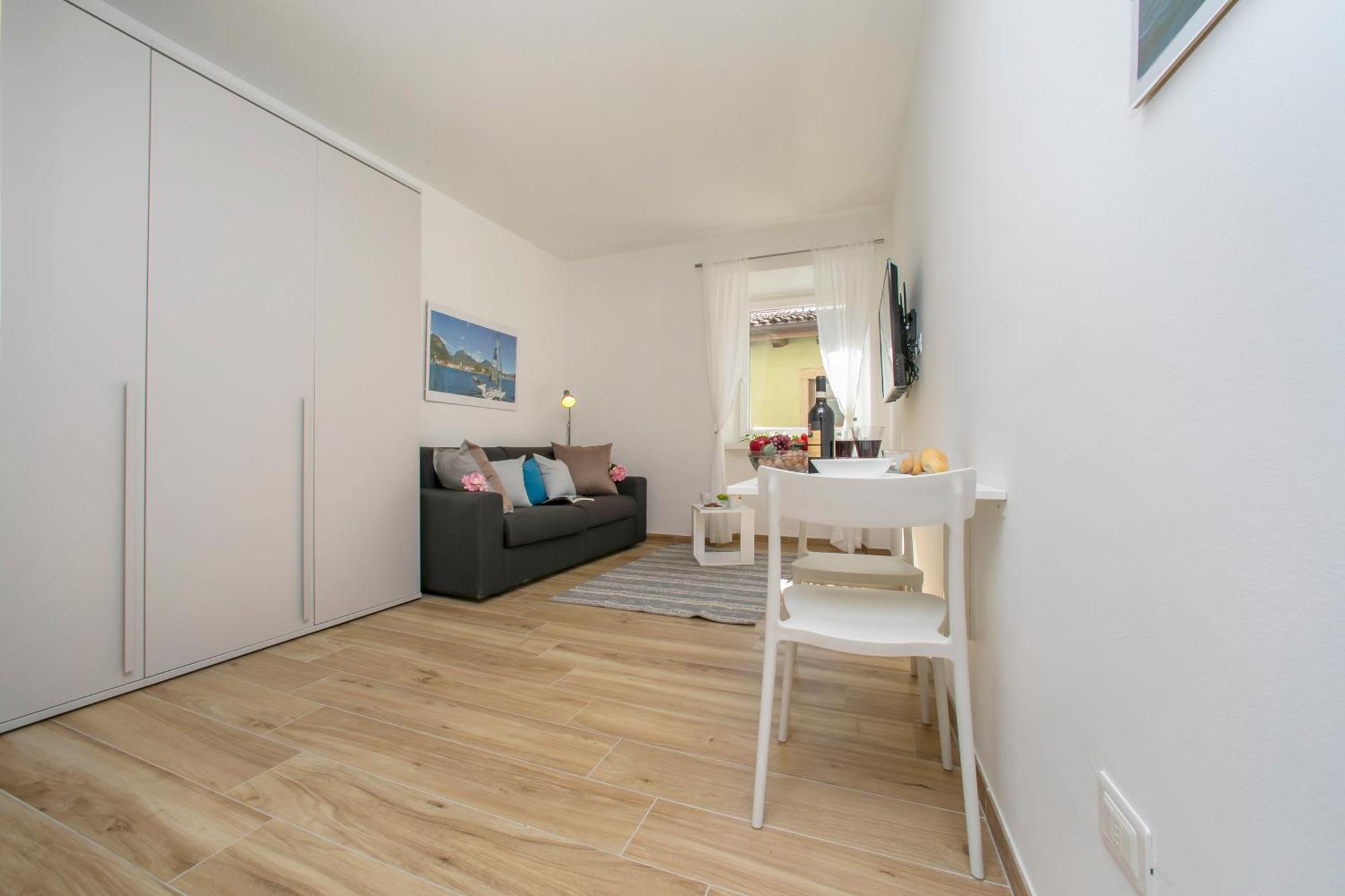 Nido Sui Tetti Di Riva Del Garda - Happy Rentals Zewnętrze zdjęcie